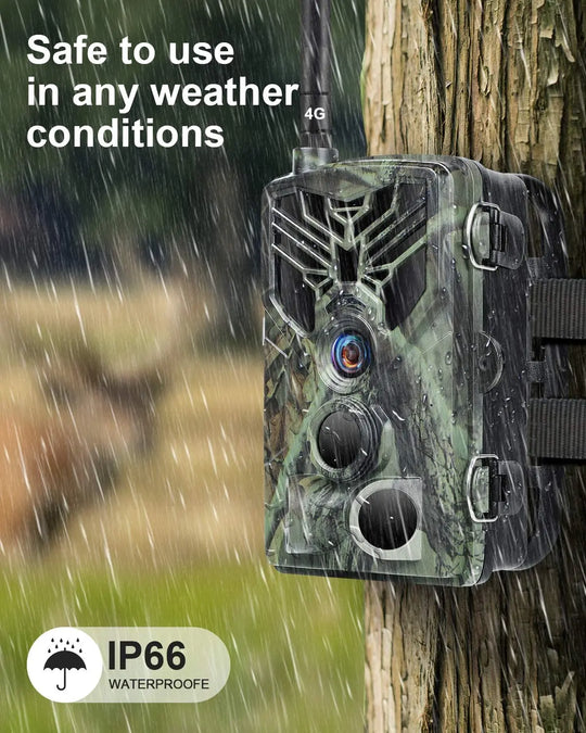 Camouflaged GPS 4G trail camera mounted on a tree in heavy rain with visible IP66 waterproof rating for wildlife monitoring and property security
