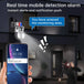GPS outdoor security camera detects an intruder at night and sends an instant mobile alert while its spotlight illuminates the monitored entrance