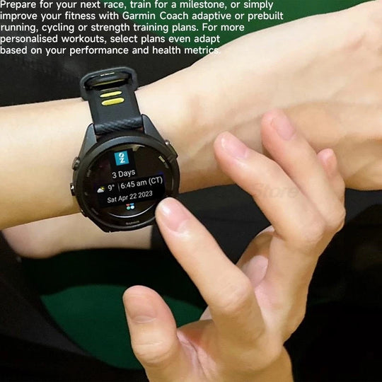 Garmin Forerunner 265 GPS smartwatch worn on a wrist, showing training and weather data on its round display
