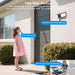 GPS outdoor security camera wall light mounted beside a front door, showing two way audio communication between a child outside and an adult indoors through the app