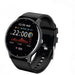 Black round touchscreen fitness smartwatch displaying time, date, activity charts, heart rate, and step count with an adjustable silicone band
