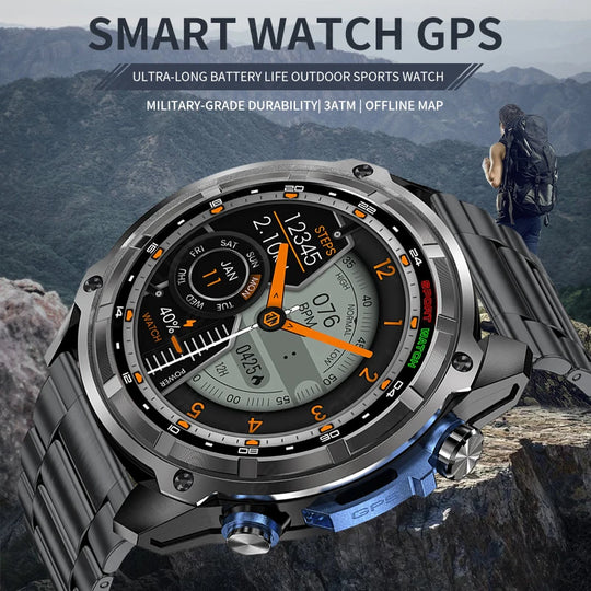 Rugged GPS smartwatch with black metal case and orange analog digital display shown against a mountain hiking scene