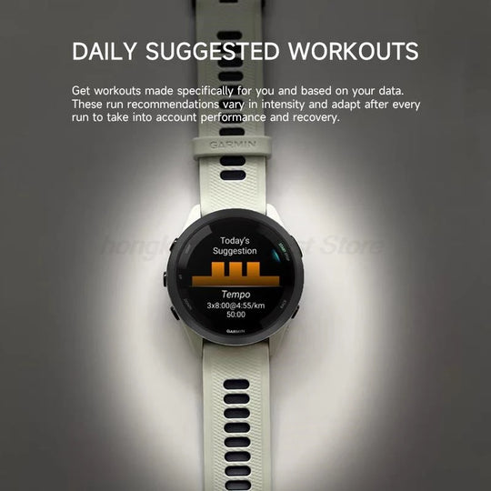 Garmin GPS smartwatch displaying daily suggested workouts and adaptive training recommendations on a light sport band