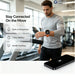 GPS smartwatch worn during treadmill exercise with built in microphone 7 day battery and health tracking shown beside a smartphone