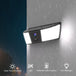 GPS 2K solar powered wall light with built in security camera, bright LED illumination, 3MP camera and 5200mAh battery shown in the rain