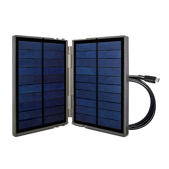 Foldable solar panel charger with two blue photovoltaic panels and an attached USB cable for a cellular trail camera